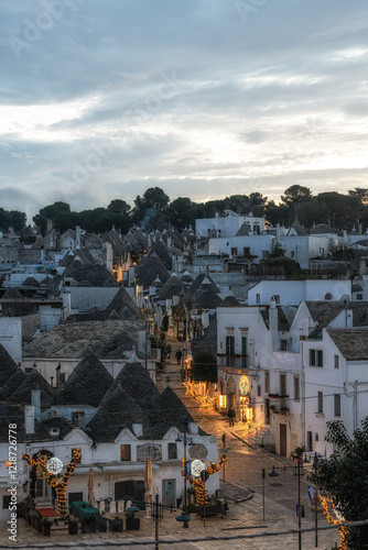 Fototapeta Naklejka Na Ścianę i Meble -  Sunset View over Trulli at Alberobello