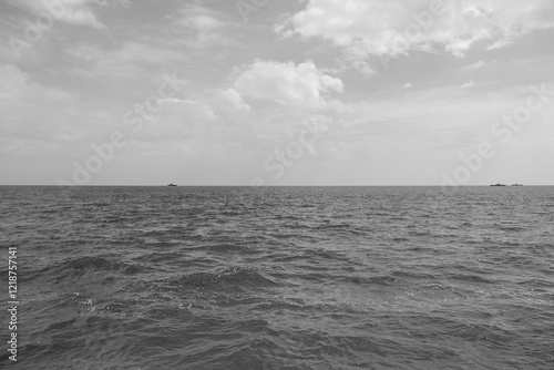 Water surface with ripples and sunlight reflections