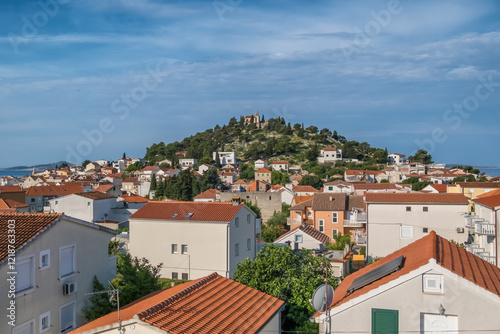 St. Nicholas church and the old town of Tribunj in Dalmatia region of Croatia photo