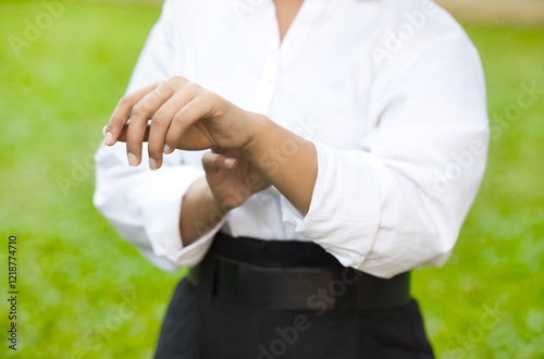 Itching and allergic Asian woman scratching her hand skin, concept of dry skin, allergic skin inflammation, body care, fungus inflammation, dermatology disease, eczema, rash, skin care closeup shot photo