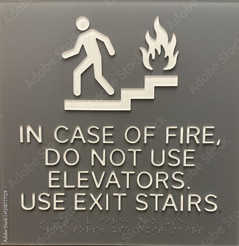 hotel fire directions sign