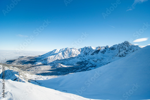 Wallpaper Mural Tatra mountains at winter time. View of the white snow-capped peaks, frosty winter mountains. Kasprowy Wierch, High Tatra, Poland, Europe. Torontodigital.ca