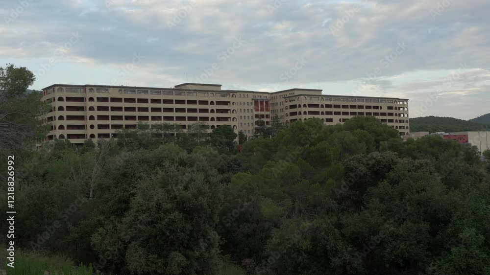 Old hospital restored as Parc Audiovisual, Terrassa, forest front wide Old hospital restored as Parc Audiovisual, Terrassa, forest front wide