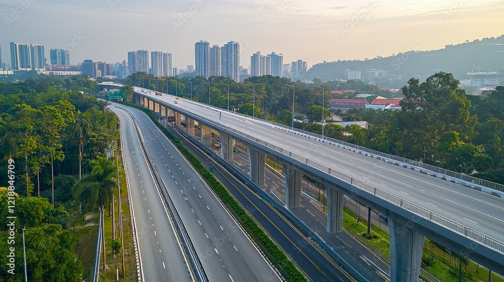 Naklejka premium Aerial View of Empty Urban Highway with City Buildings in Distance