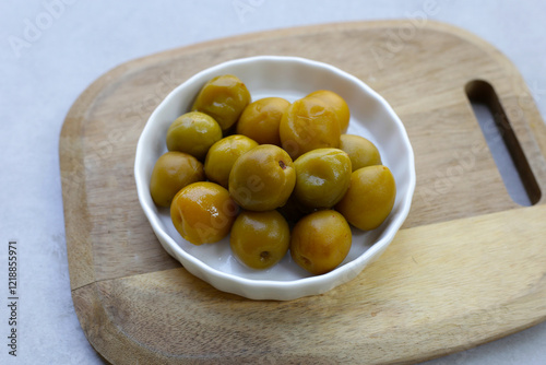 Pickled Chinese plums or Japanese apricots photo