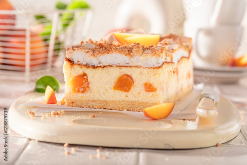 Swee and fresht cheesecake with peaches and cocoa foam.