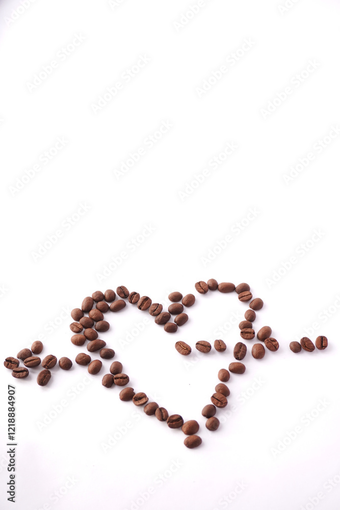 A heart shape creatively formed using roasted coffee beans arranged on a clean white background, symbolizing love for coffee and appreciation for its rich aroma and flavor. A heart shape creatively formed using roasted coffee beans arranged on a clean white background, symbolizing love for coffee and appreciation for its rich aroma and flavor.