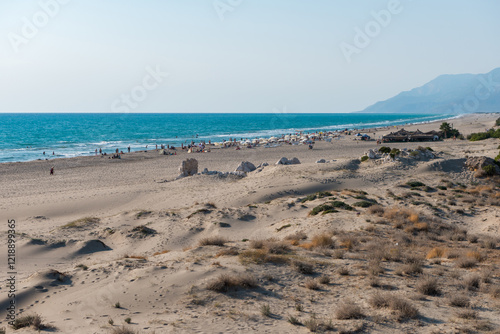 Fototapeta Naklejka Na Ścianę i Meble -  Mediterranean seacoast at the Patara beach on a sunny day with blue sea Antalya region, Turkey.