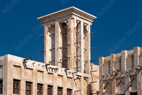 Souq Waqif is a souq in Doha, in the state of Qatar. The souq is known for selling traditional garments, spices, handicrafts, and souvenirs photo