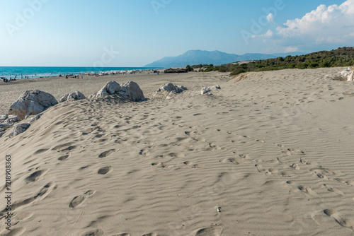 Fototapeta Naklejka Na Ścianę i Meble -  Mediterranean seacoast at the Patara beach on a sunny day with blue sea Antalya region, Turkey.