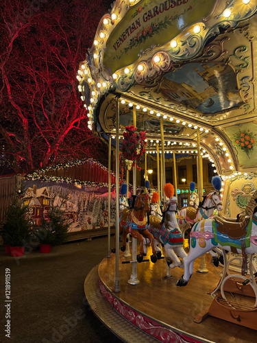 Festively decorated Christmas carousel with colorful horses and ornate lights at the Poznań Christmas Market in Poland, surrounded by holiday decorations and an advent calendar backdrop