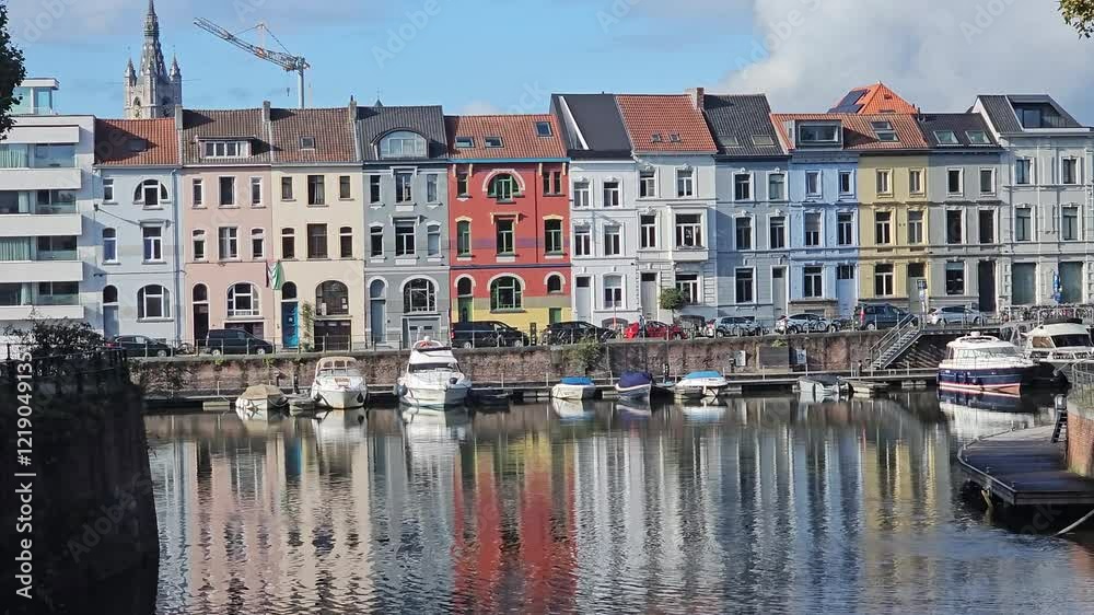 Summer Streets and Riverside Views of Ghent: Historic Buildings along the River, Gent, Belgium Summer Streets and Riverside Views of Ghent: Historic Buildings along the River, Gent, Belgium