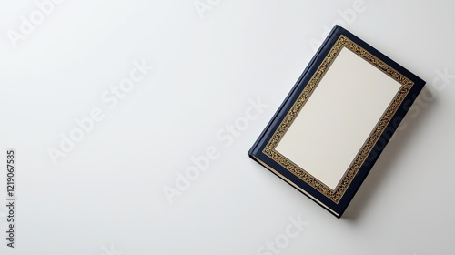 Ornate Cover of Quran Book Displayed Elegantly on a Simple Background for Content and Presentation Purposes photo