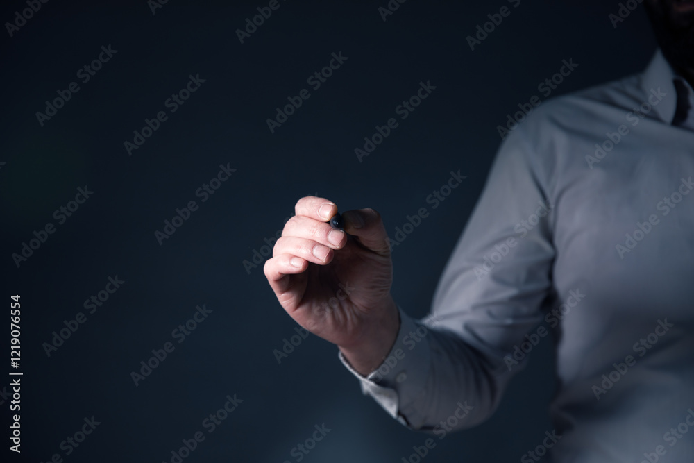 Fototapeta premium Person using a pen to write digitally