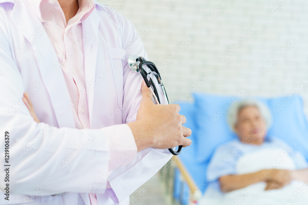 Naklejka premium Asian doctor portrait in recovery ward in hospital with copy space.