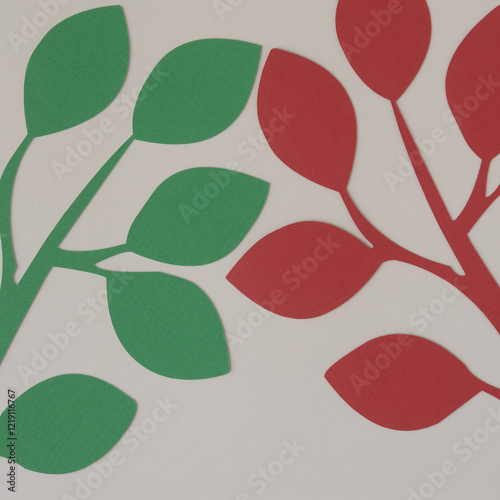 close-up of green and red foliage abstraction on beige photo