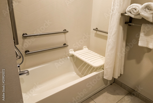 Accessible shower bath tub with handles and seat