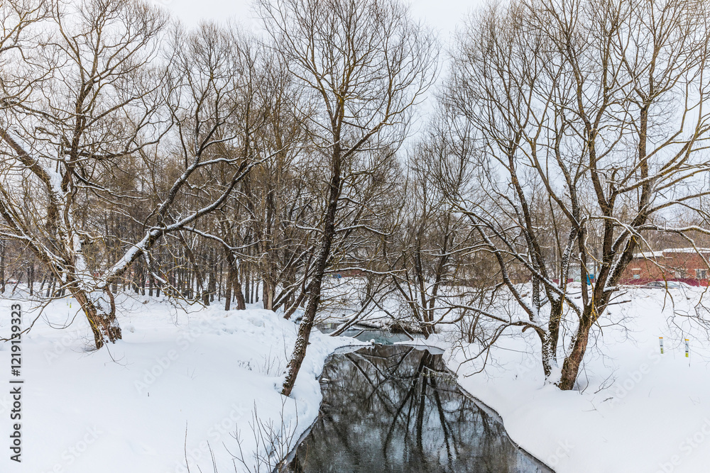 Fototapeta premium Park near The Intercession women's Orthodox Khotkov monastery, through which there was a passage to the Trinity-Sergius Lavra in Khotkovo, Moscow Region, Russia