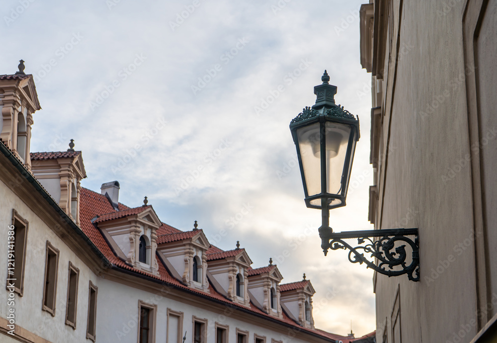Beautiful street lamp on the wall of an old house in Prague Beautiful street lamp on the wall of an old house in Prague