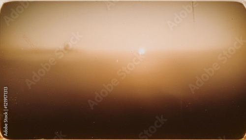 Vintage distressed abstract old photo of foggy sunrise, film grain, dust and scratches texture effect