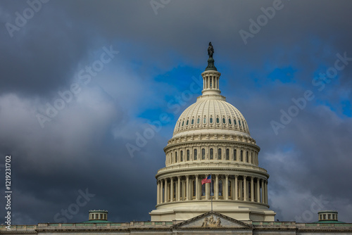 Wallpaper Mural US Capitol Building in Washington, DC - Partial View of the Dome with US Flag; dark Clouds in Background; Close-up with Copy Space Torontodigital.ca
