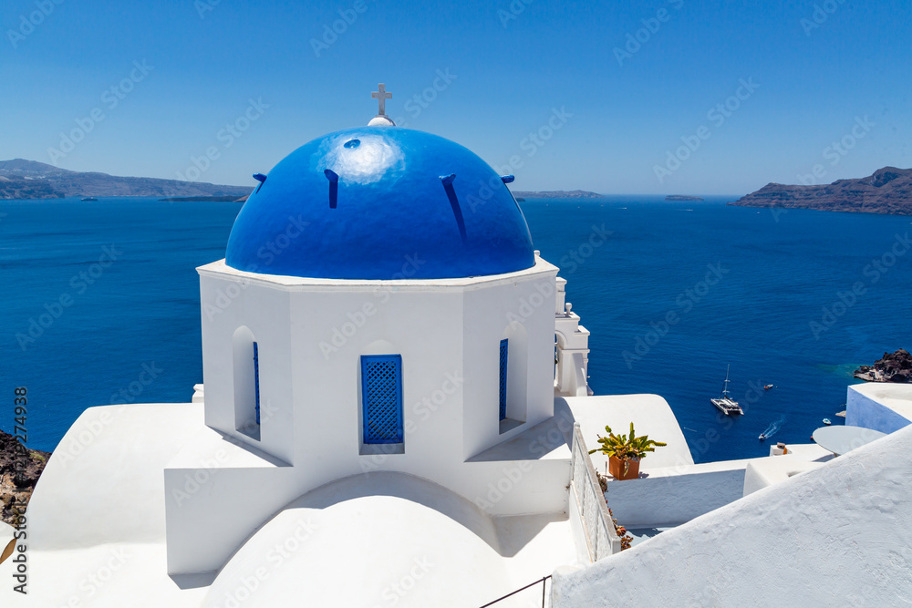 Blue dome church in Oia on Santorini-Greece