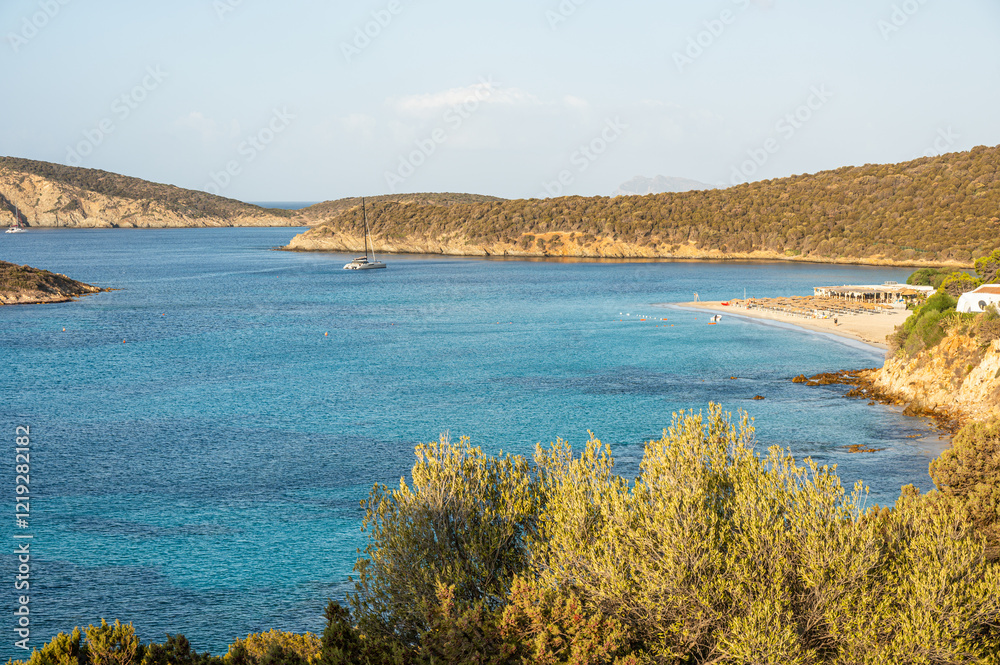 Aerial view of Tuerredda bay with the beach of fine sand and transparent blue and turquoise water