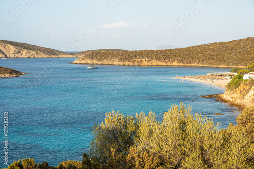 Obraz na płótnie Aerial view of Tuerredda bay with the beach of fine sand and transparent blue and turquoise water w salonie