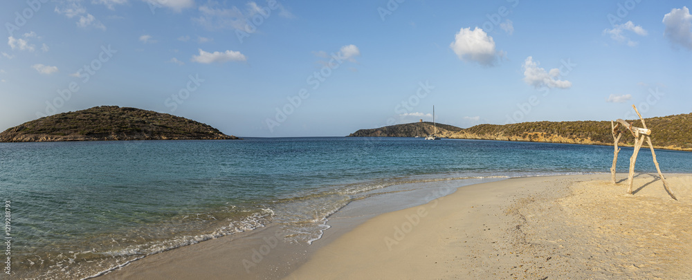 Aerial view of Tuerredda bay with the beach of fine sand and transparent blue and turquoise water