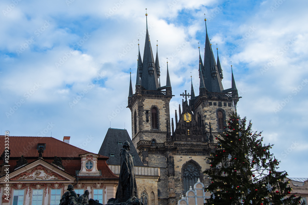 A large Christmas tree in front of the Tyn Church in Prague