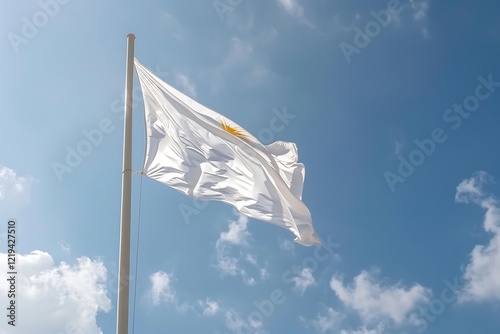 Flag of the Republic of Cyprus waving in the wind against the blue sky photo