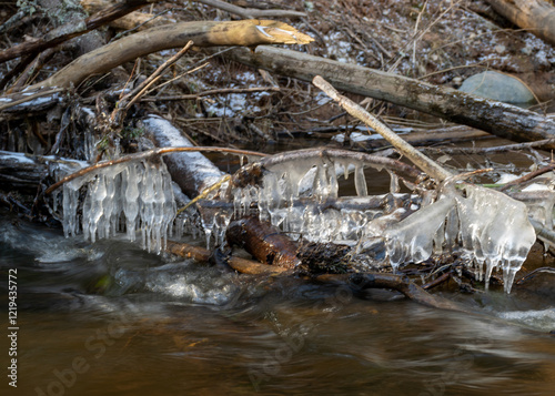 ice formations in a wild river, beautiful frozen ice formations from the interaction of water, flow and frost, Raunis, Latvia photo