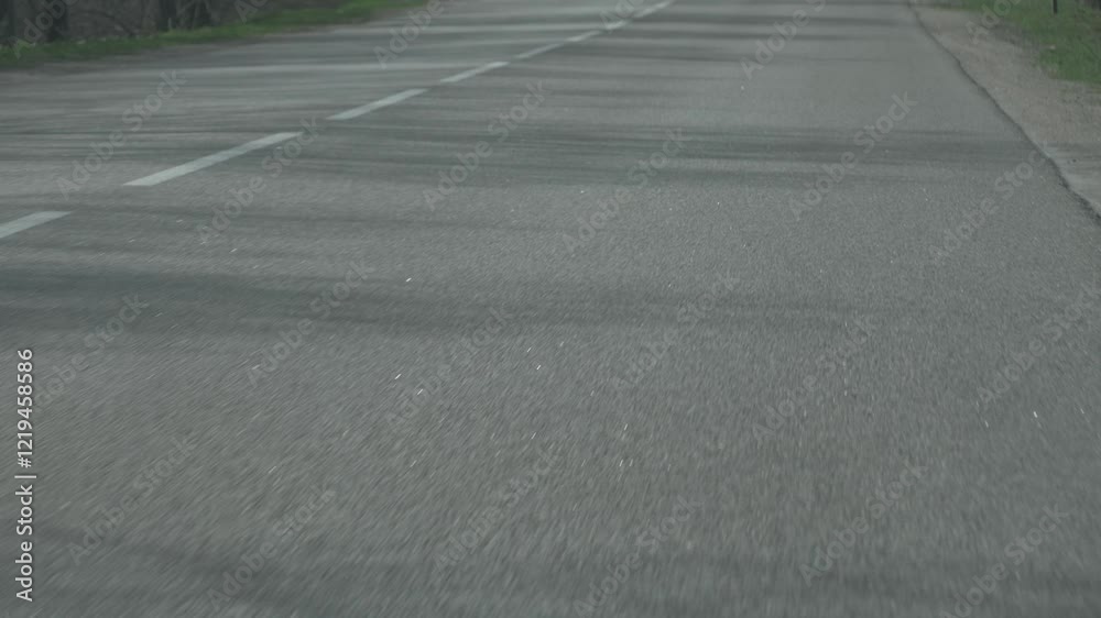 Open road with central lane separation ideal for vacation journeys or weekend escapes. Smooth asphalt offers a reliable path for adventure. Designed for safe, enjoyable trips across scenic routes Open road with central lane separation ideal for vacation journeys or weekend escapes. Smooth asphalt offers a reliable path for adventure. Designed for safe, enjoyable trips across scenic routes