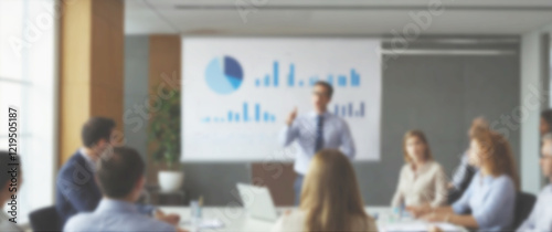 Blurred background of an office worker conducting a professional presentation with detailed infographics, wide photo