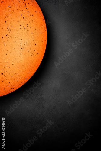  an orange sun on a black background, creating a striking contrast between the two colors The sun is the focal point of the image, with its bright orange hue standi photo