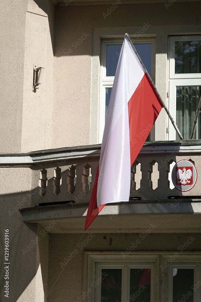 Polish flag on building of consulate of Poland