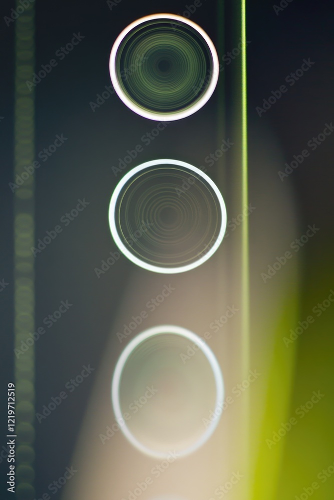 A blurry photo of a traffic light at night, great for use in scenes about traffic, roads, or urban environments A blurry photo of a traffic light at night, great for use in scenes about traffic, roads, or urban environments