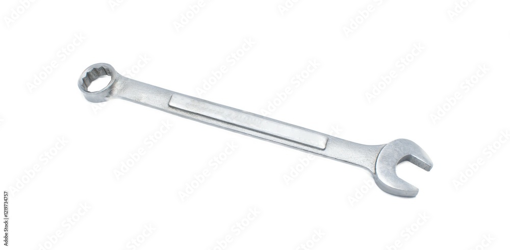Combination wrench or spanner is a tool used to provide grip and turn nuts and bolts, and similarly shaped objects. It has an open and ring end. isolated on white background with copy space Combination wrench or spanner is a tool used to provide grip and turn nuts and bolts, and similarly shaped objects. It has an open and ring end. isolated on white background with copy space