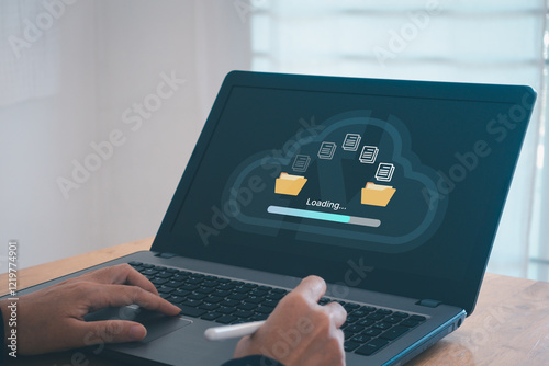 Transfer files data system relocation cloud technology concept. Backup, exchange, share. Person hand using laptop computer waiting for transfer file process with loading bar icon on virtual screen.