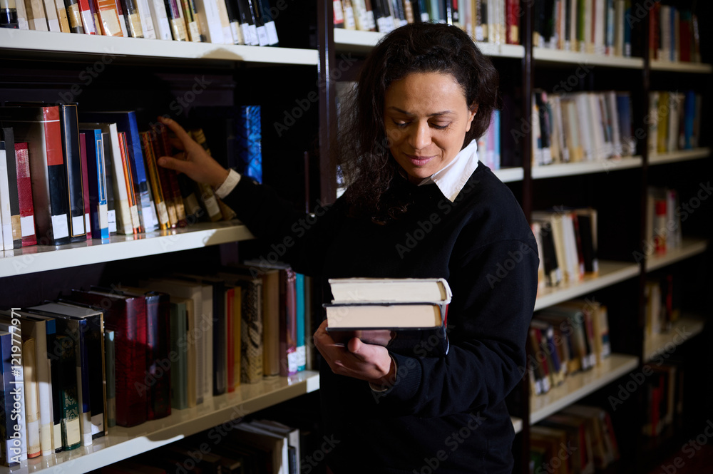 A thoughtful woman explores a library, carefully selecting books to read on various topics. A thoughtful woman explores a library, carefully selecting books to read on various topics.