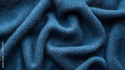 Deep blue teal coat folded fabric close up wavy backdrop. Web banner. Wide. Flat lay, top view table. 