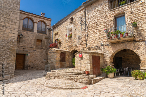 Square of the Montfalco murallat walled medieval village the Lerida province, Cataluña, Spain, in a sunny day.
