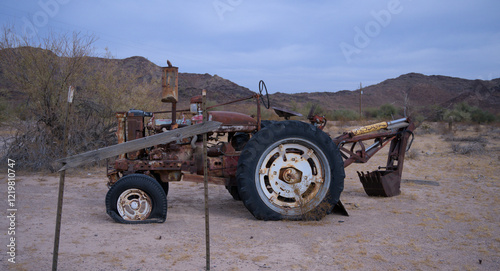 Decaying Tractor Yard Art on Display photo