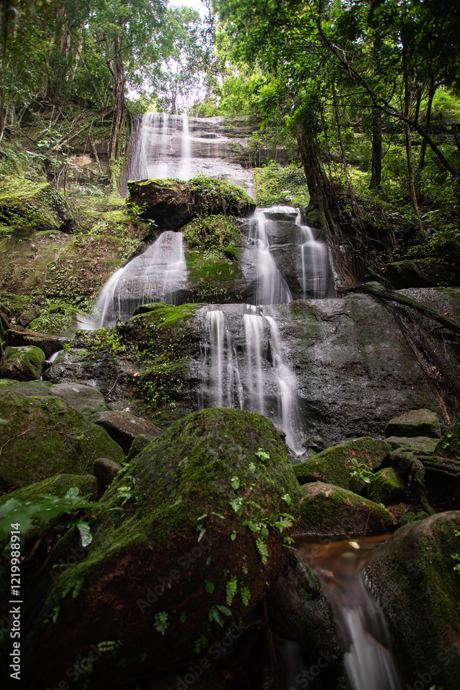 Natural waterfall in the interior of the South Kalimantan forest, so cool and still pristine Natural waterfall in the interior of the South Kalimantan forest, so cool and still pristine