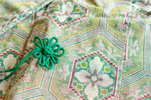 Close-up of kimono and decorative strings