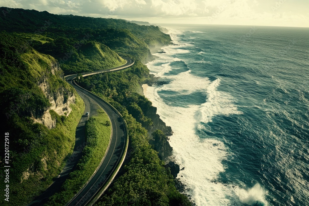 An impressive aerial shot of a coastal road that curves elegantly along the shoreline, with crashing waves and lush vegetation creating a stunning visual of the landscape. An impressive aerial shot of a coastal road that curves elegantly along the shoreline, with crashing waves and lush vegetation creating a stunning visual of the landscape.