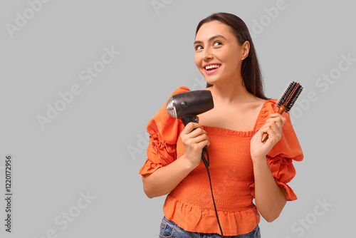 Beautiful young woman with ...
