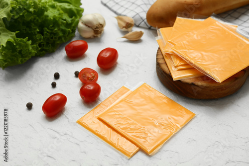 Packaged sliced cheese with...