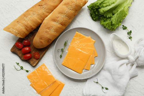 Fresh baguettes, sliced che...