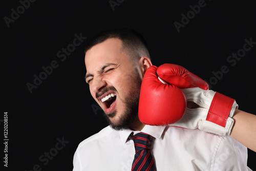 Young businessman getting h...